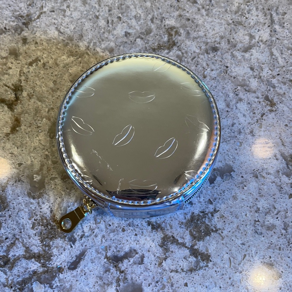 Yves Saint Laurent silver reflective zip pouch